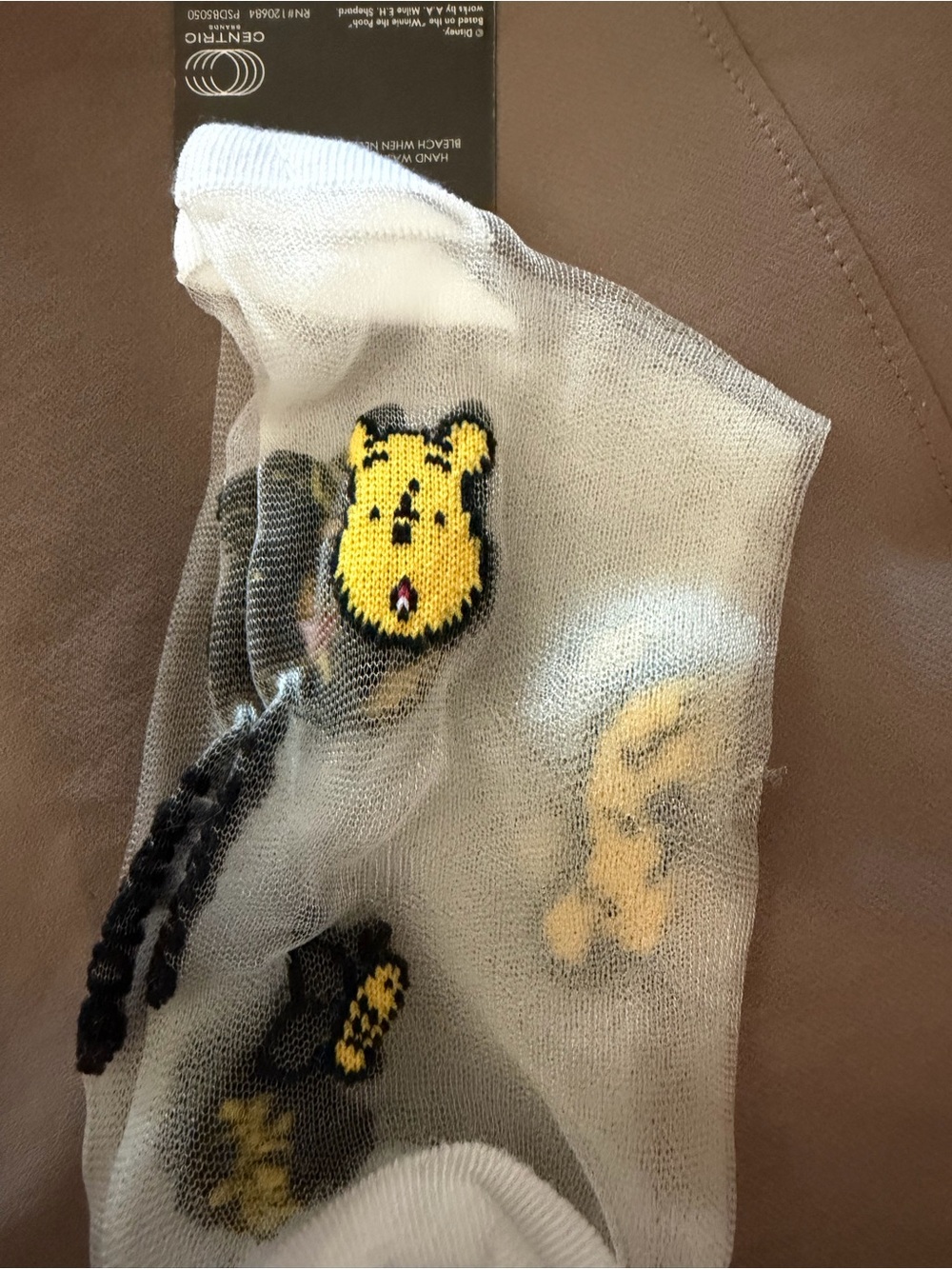 Disney White Sheer Socks with Yellow & Black Winnie the Pooh Accents - Picture 9 of 9